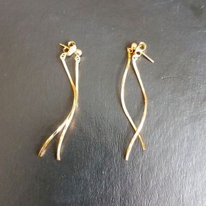 Gold colored dangly earrings